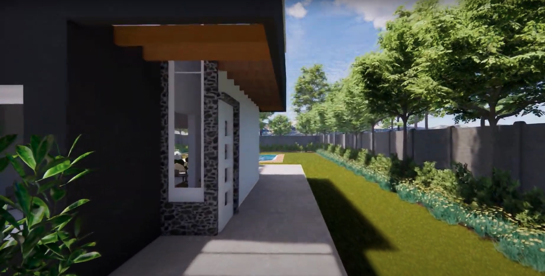 Casa TRES: Costado de la casa con camino peatonal y jardín